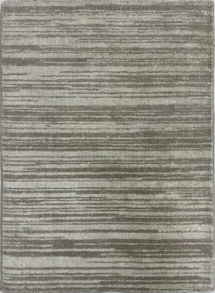 Ковер из натуральной новозеландской шерсти и искусственного шелка с однотонным рельефом и эффектом состаривания