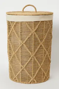 Круглая корзина для белья из бумажного шнура