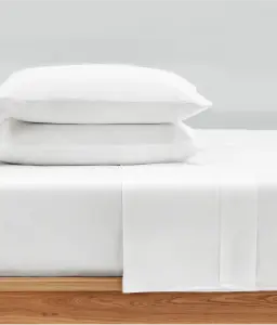 Комплект простыней с наволочками из хлопка однотонный