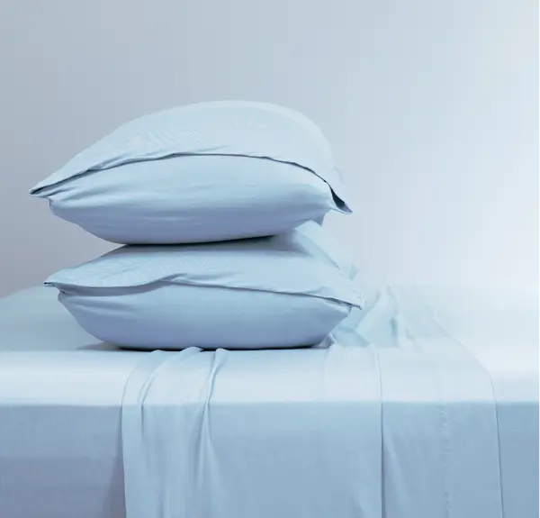 Комплект простыней с наволочками из хлопка однотонный