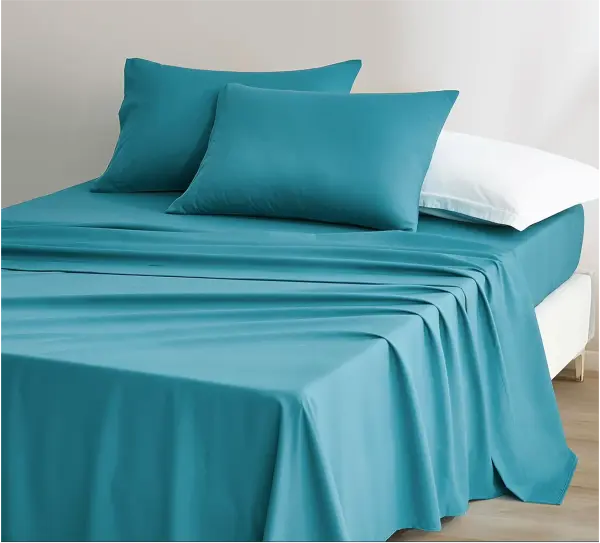 Комплект простыней с наволочками из хлопка однотонный